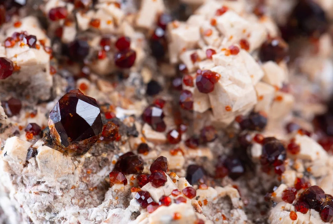 Garnet mineral specimen in stone