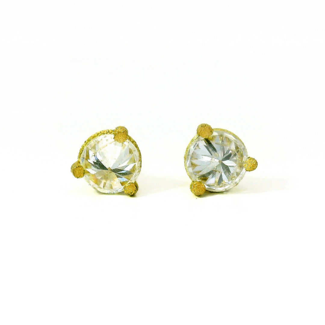 Turned Light inverted diamond studs by Todd Pownell in 18K yellow gold