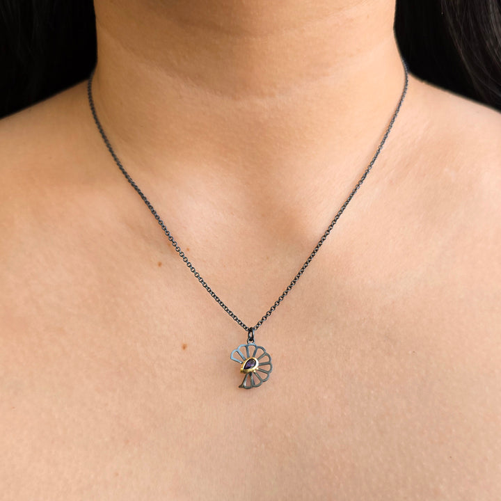 Petite Hyacinth pendant with pear-shaped sapphire and openwork silver petals