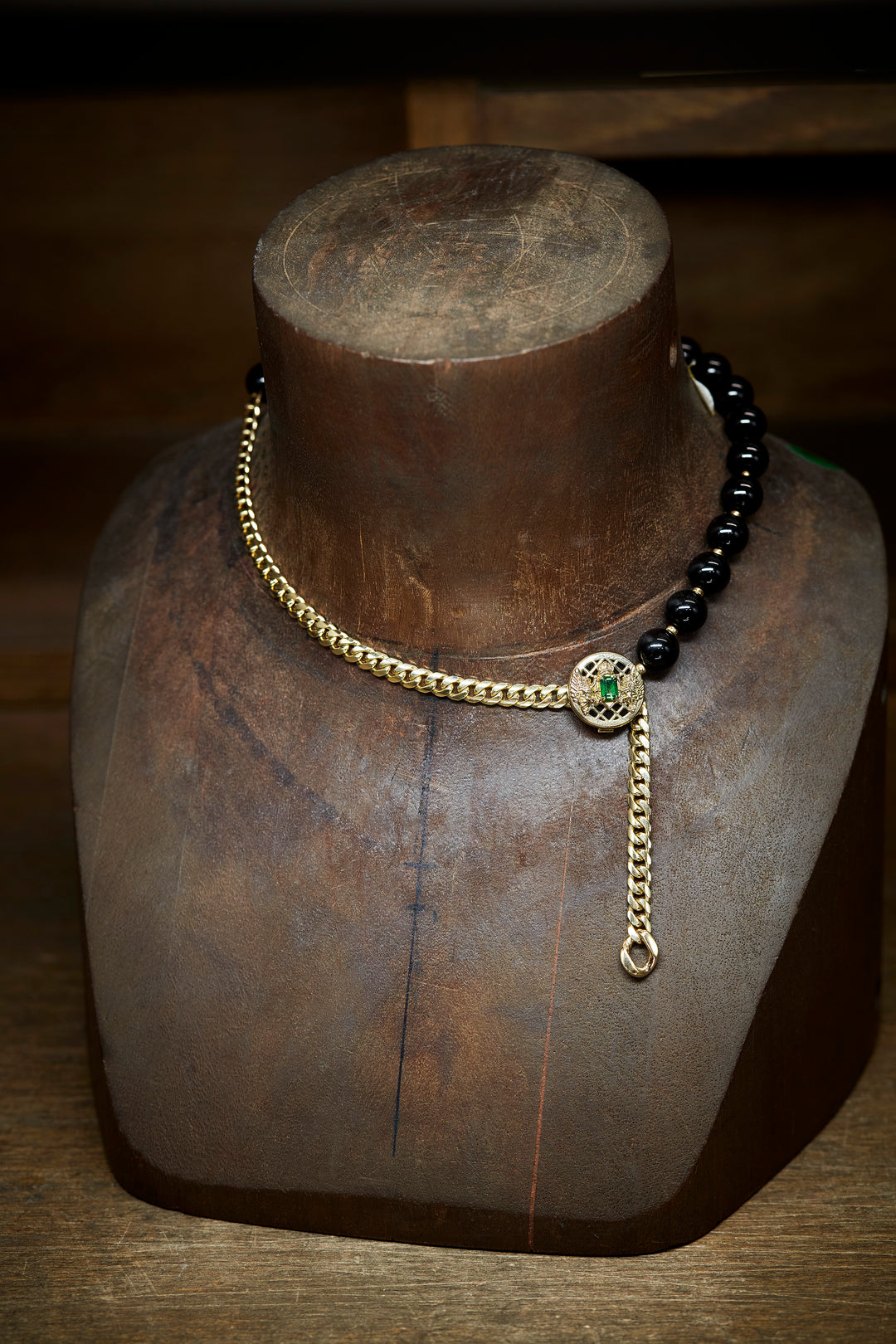 Balmain yellow gold necklace with black onyx and tsavorite garnet. Alara Jewelry is one of ten jewelers in the US to carry Balmain