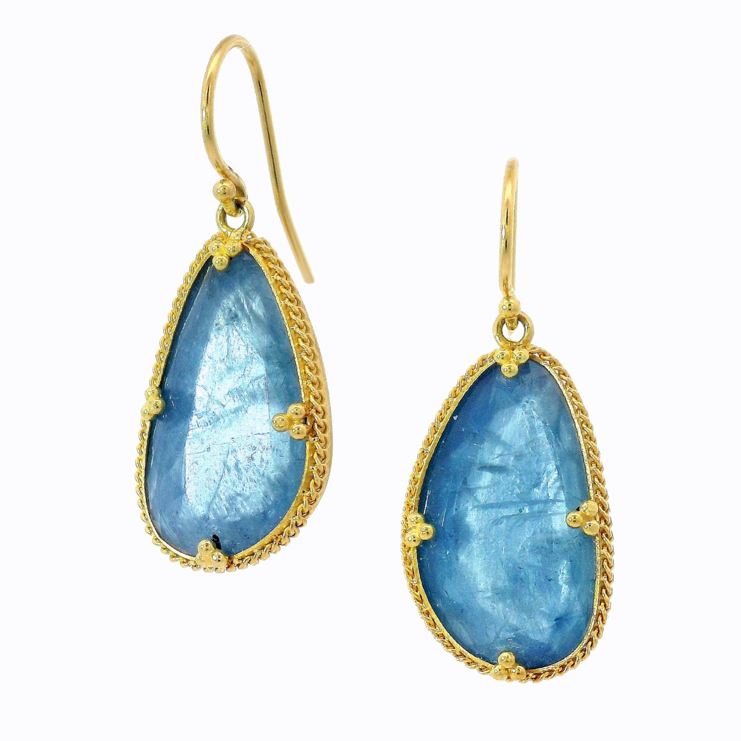 Sea Through aquamarine earrings by Amáli with freeform pear-shaped stones in 18K yellow gold