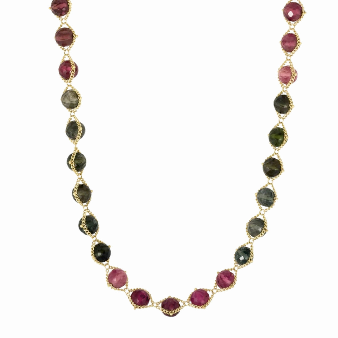 Multicolored tourmaline strand in raspberry, violet, green, and smoky blue