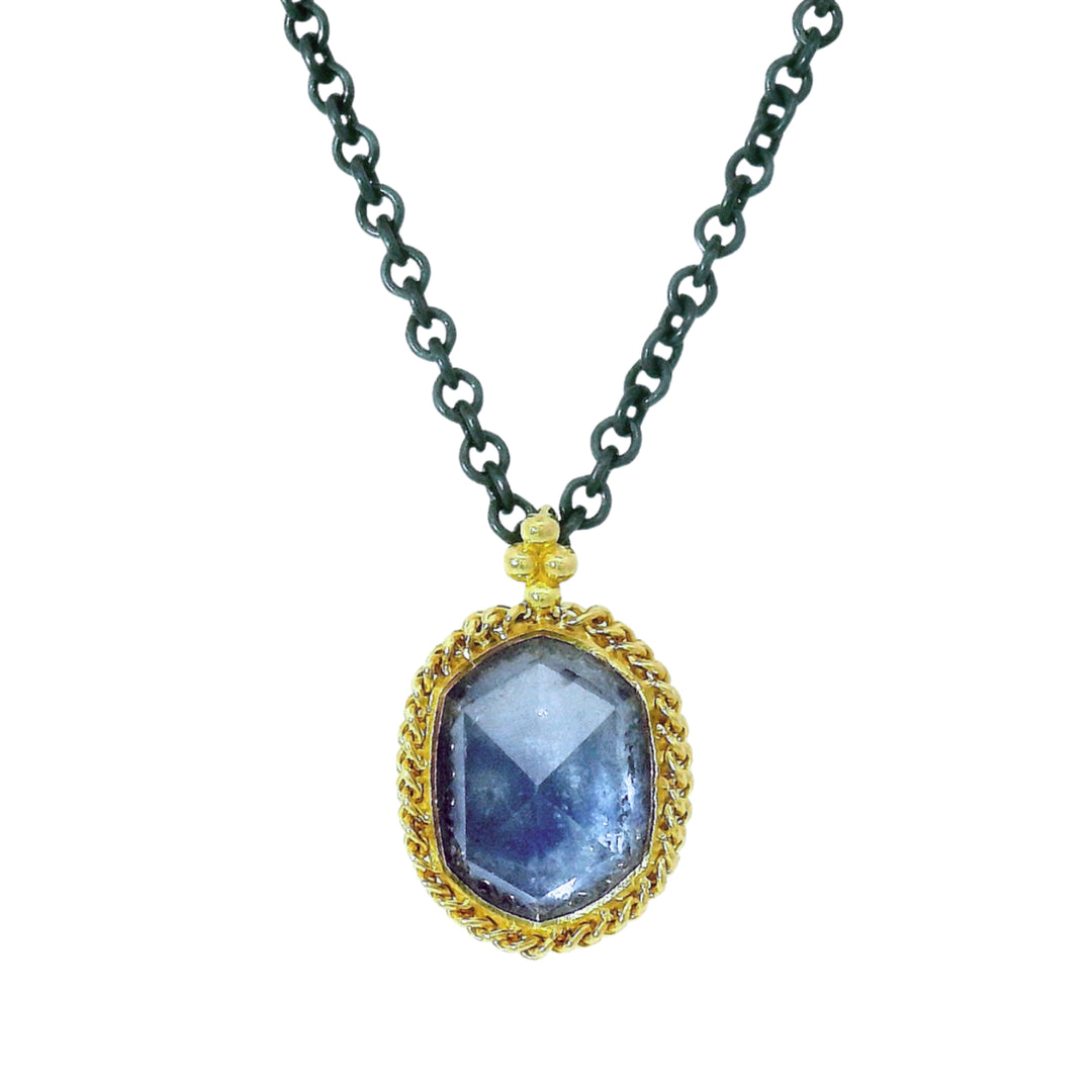 Oval rose-cut Montana sapphire pendant with gold bezel setting