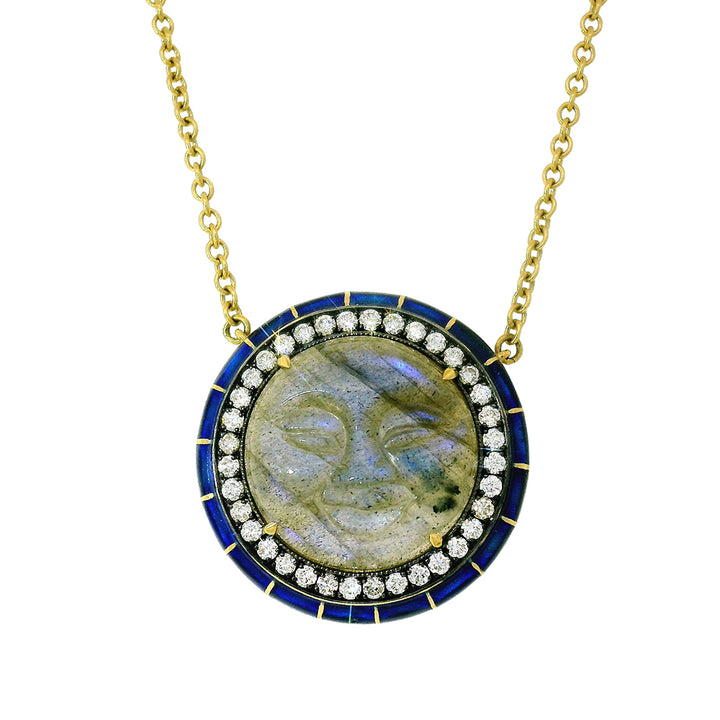 Necklace with a round pendant featuring a moon face design, blue border, and gold accents on a white background.