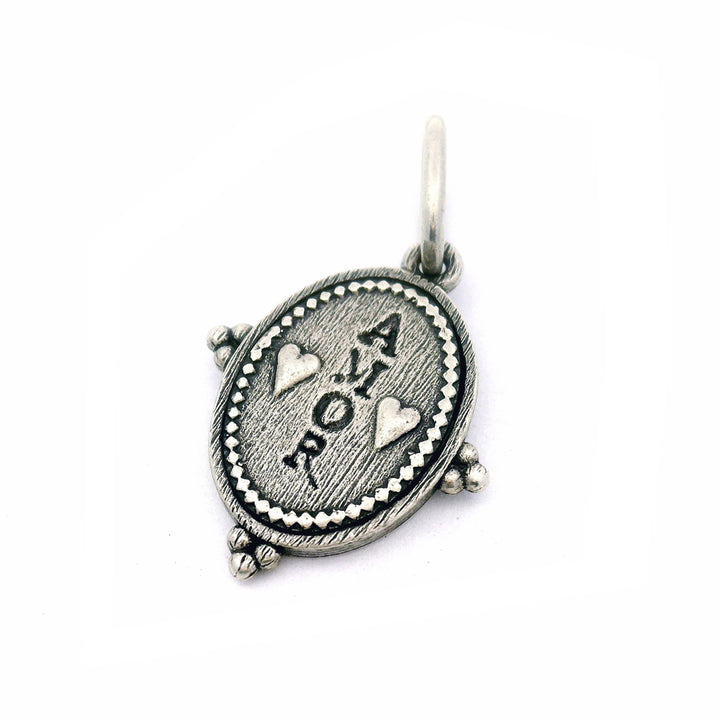 Silver Pendant with Amor and Hearts against white background