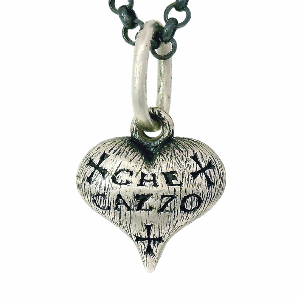 hand-carved heart charm by Erica Molinari from Alara Jewelry