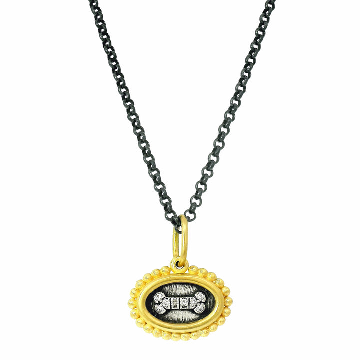 reversible dog bone and AMORE charm pendant from Alara Jewelry