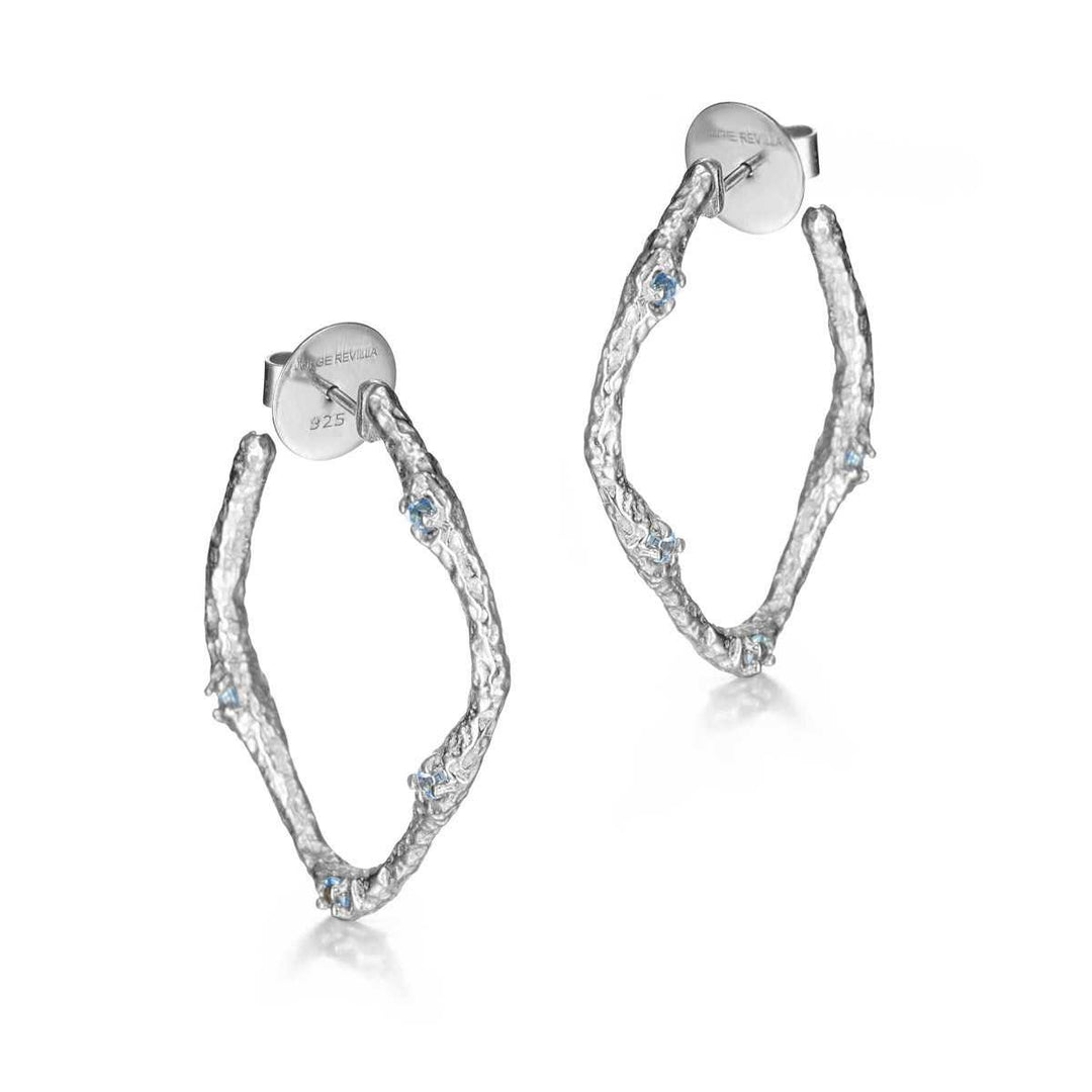Lava Collection blue topaz hoop earrings by Jorge Revilla in sterling silver