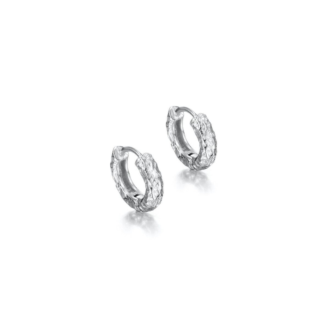 Lava Collection textured sterling silver huggie hoops by Jorge Revilla