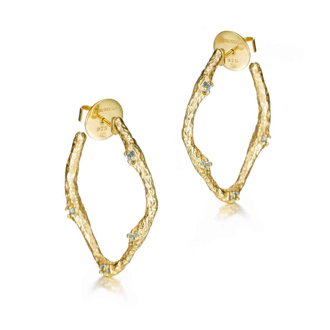 Lava Collection blue topaz hoop earrings by Jorge Revilla in gold vermeil