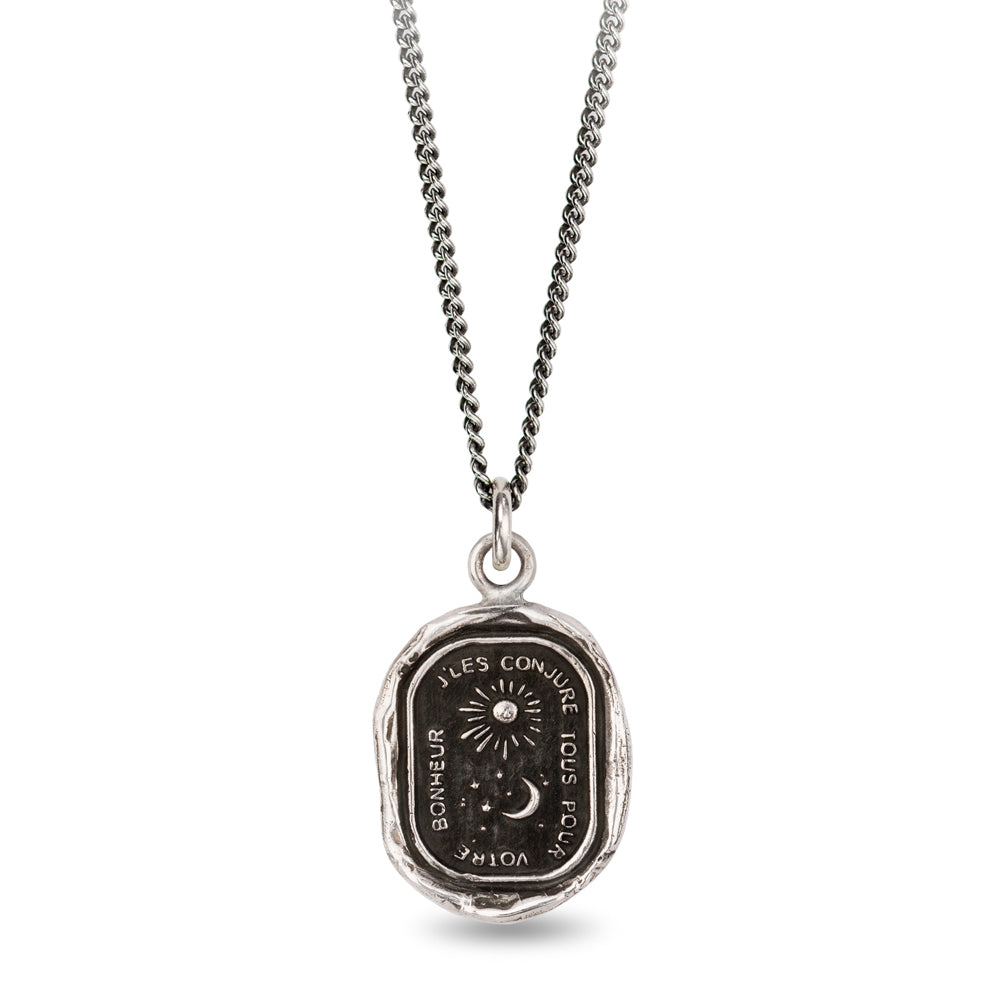Sun, moon, and stars talisman necklace by Pyrrha in sterling silver
