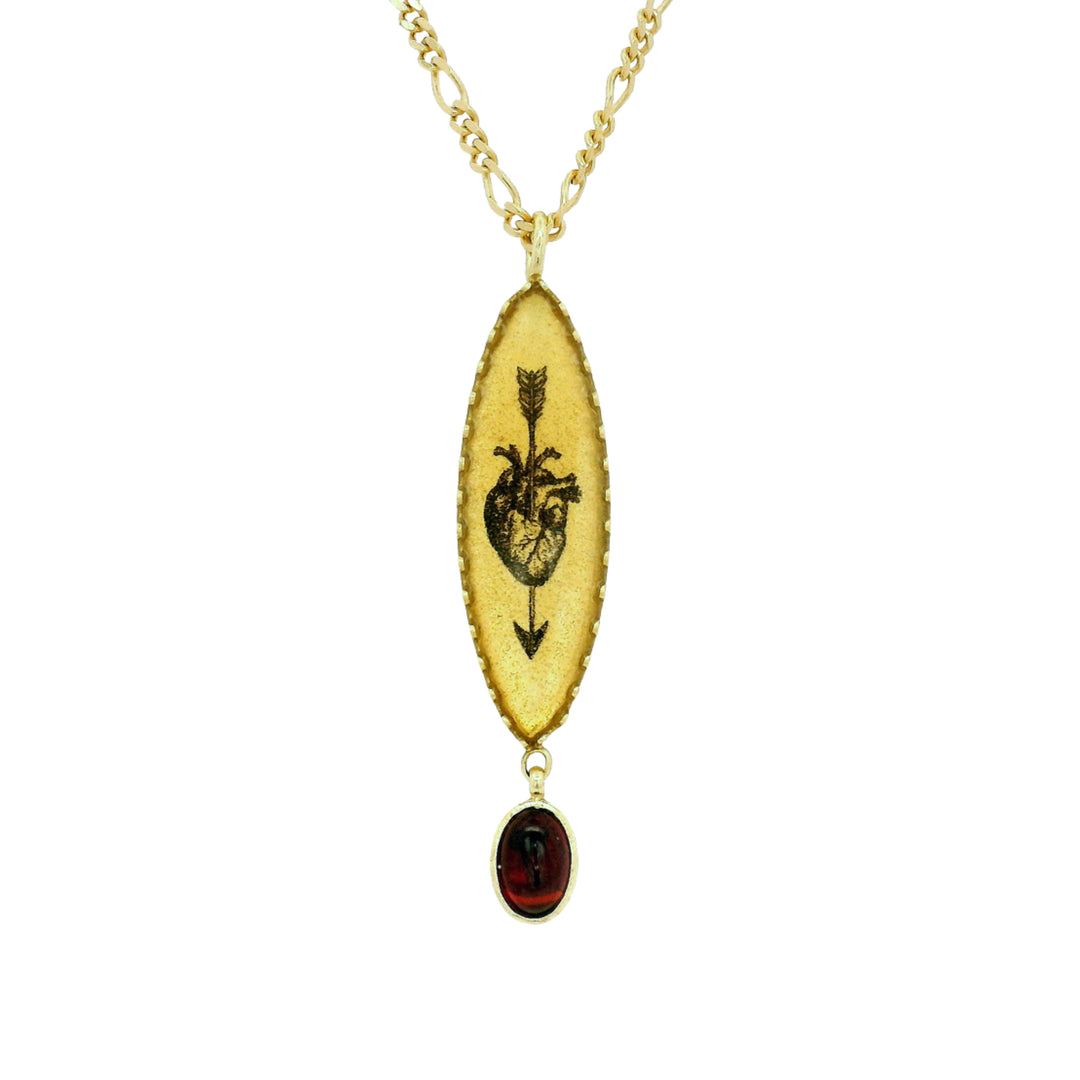 Anatomical heart pendant with almandine garnet drop by Anna Bánkuti
