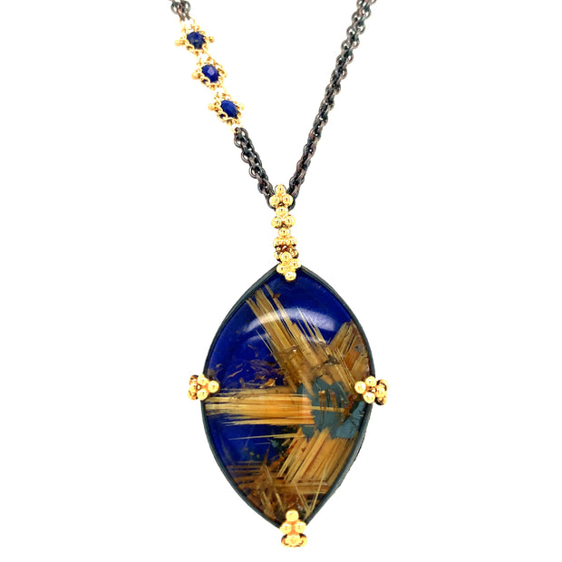 lapis lazuli and rutilated quartz doublet  pendant on an oxidized sterling silver chain with small lapis accents and yellow gold